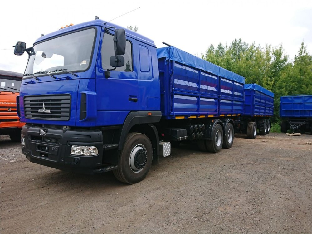 Автопоезд из зерновоза МАЗ 6501С5-8550-000 и самосвального прицепа