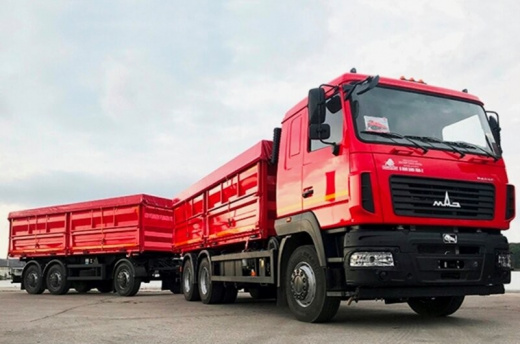 Автопоезд из зерновоза МAЗ 65012J-8535-000 и самосвального прицепа MАЗ-856103-022-000